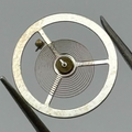 E.S. 50 Balance Wheel Complete And Spring 12’’’ Renata 1400 Watch Movement Parts