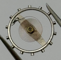 EB 1197 Balance Wheel Complete And Spring 10½’’’ 108 M Watch Movement Parts NOS