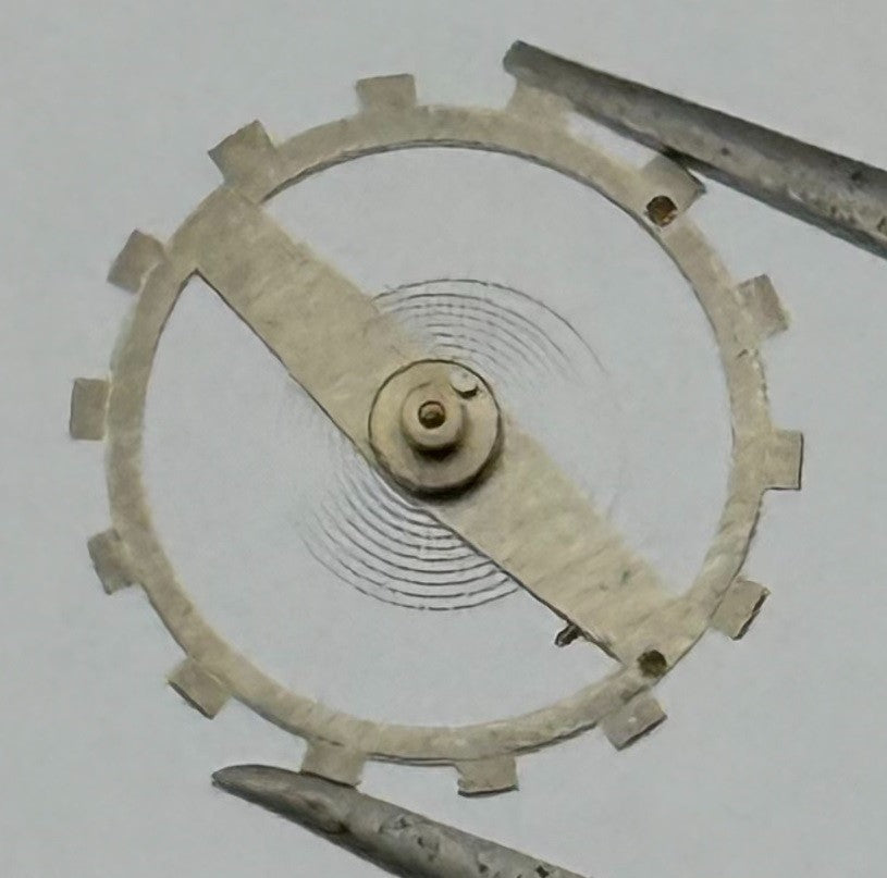 EB 1197 Balance Wheel Complete And Spring 10½’’’ 103 M Watch Movement Parts NOS